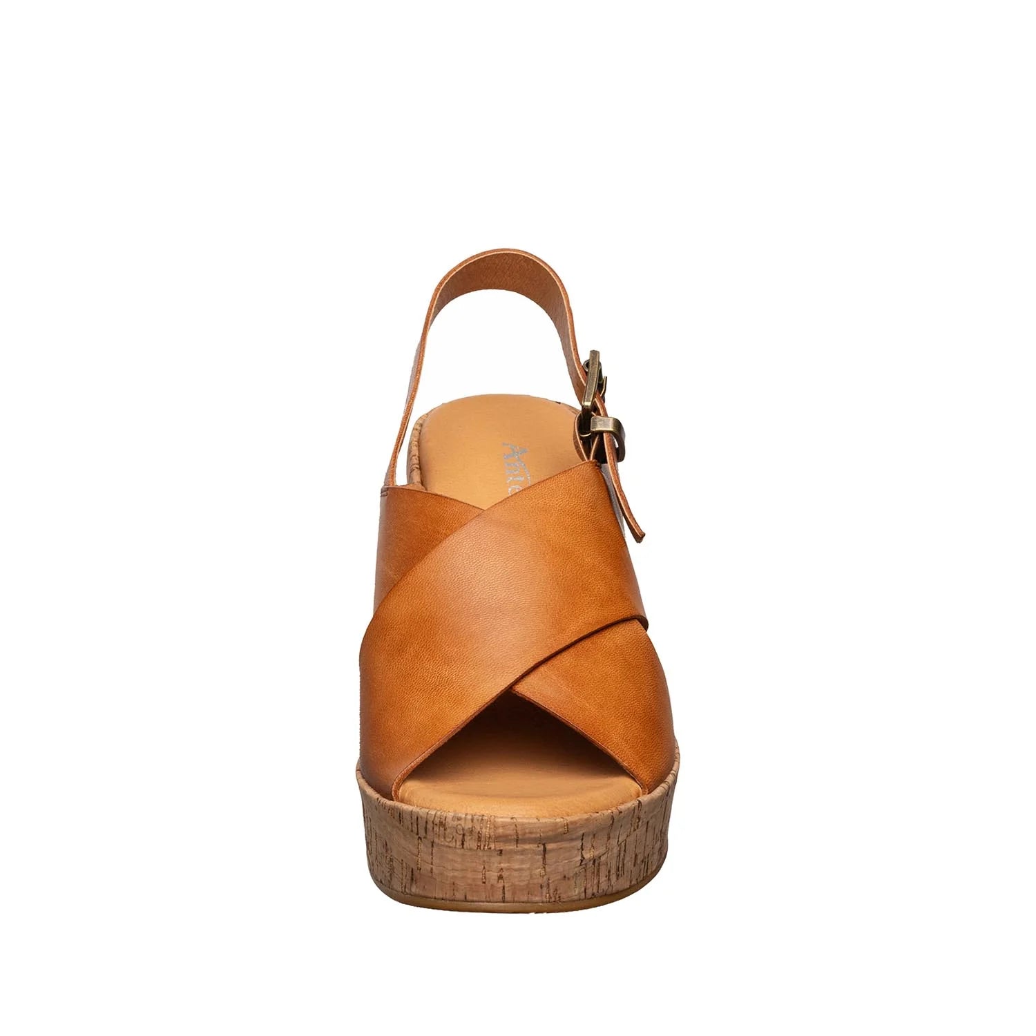 Brown sandal with cork wedge sole on a white background