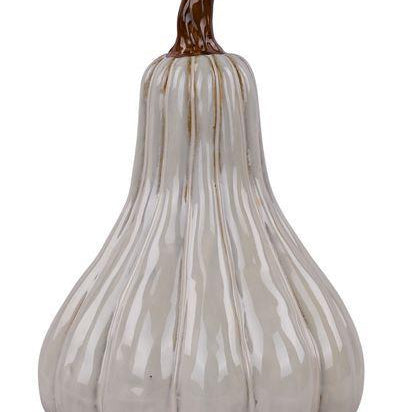 A decorative ceramic pumpkin with a glossy off-white glaze and vertical ribbing, featuring a curved brown stem, isolated on a white background.