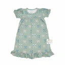 Green gown with bows on white background