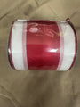 Red and white wired ribbon roll with dot mesh border and wired edge