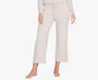 Person wearing light-colored pants on a white background