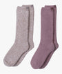 Two pairs of socks, one gray and one purple, on a white background.