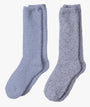 Pair of light blue socks on a white background