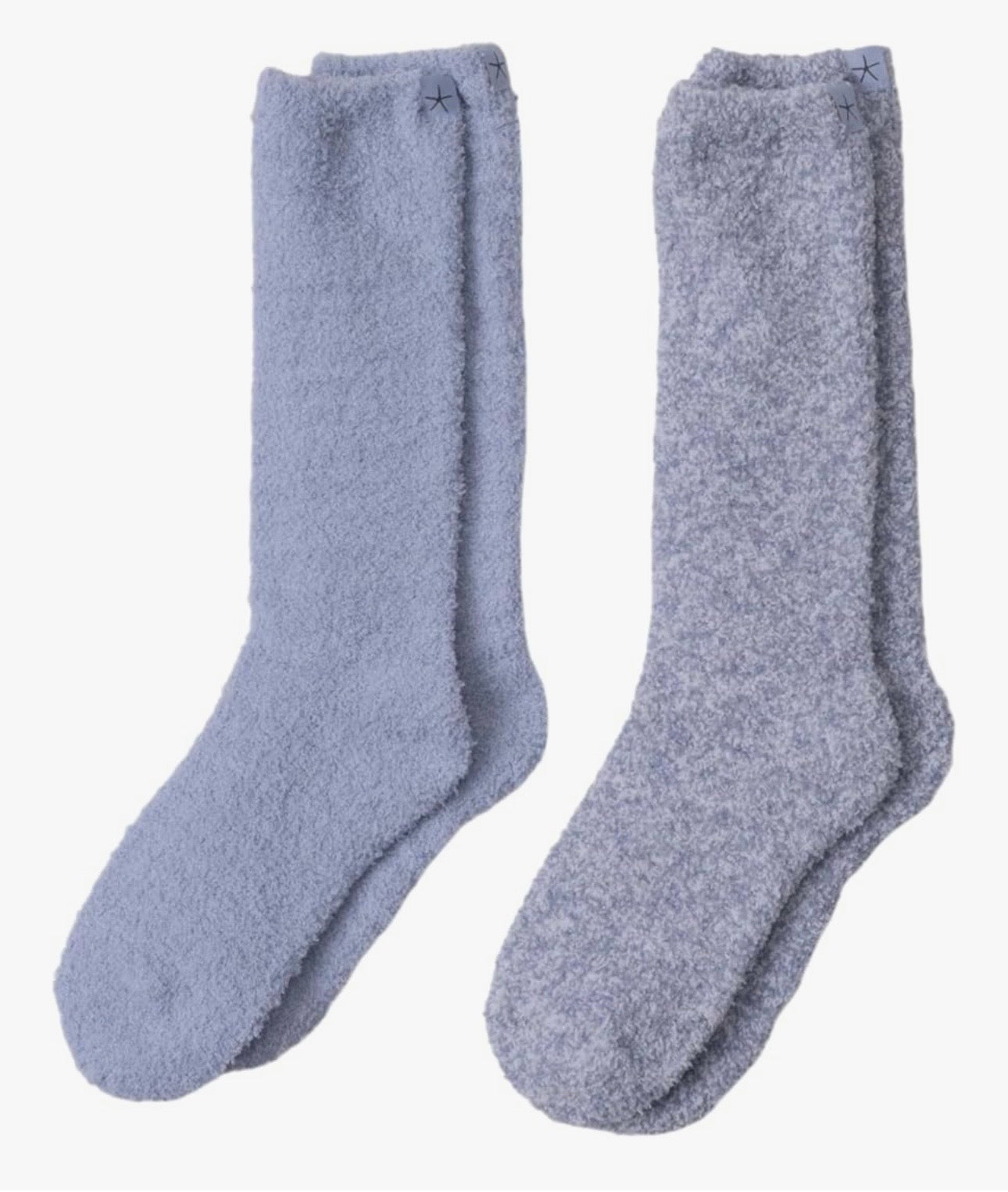 Pair of light blue socks on a white background