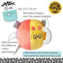 Toy with colorful design and text describing features, on a patterned background