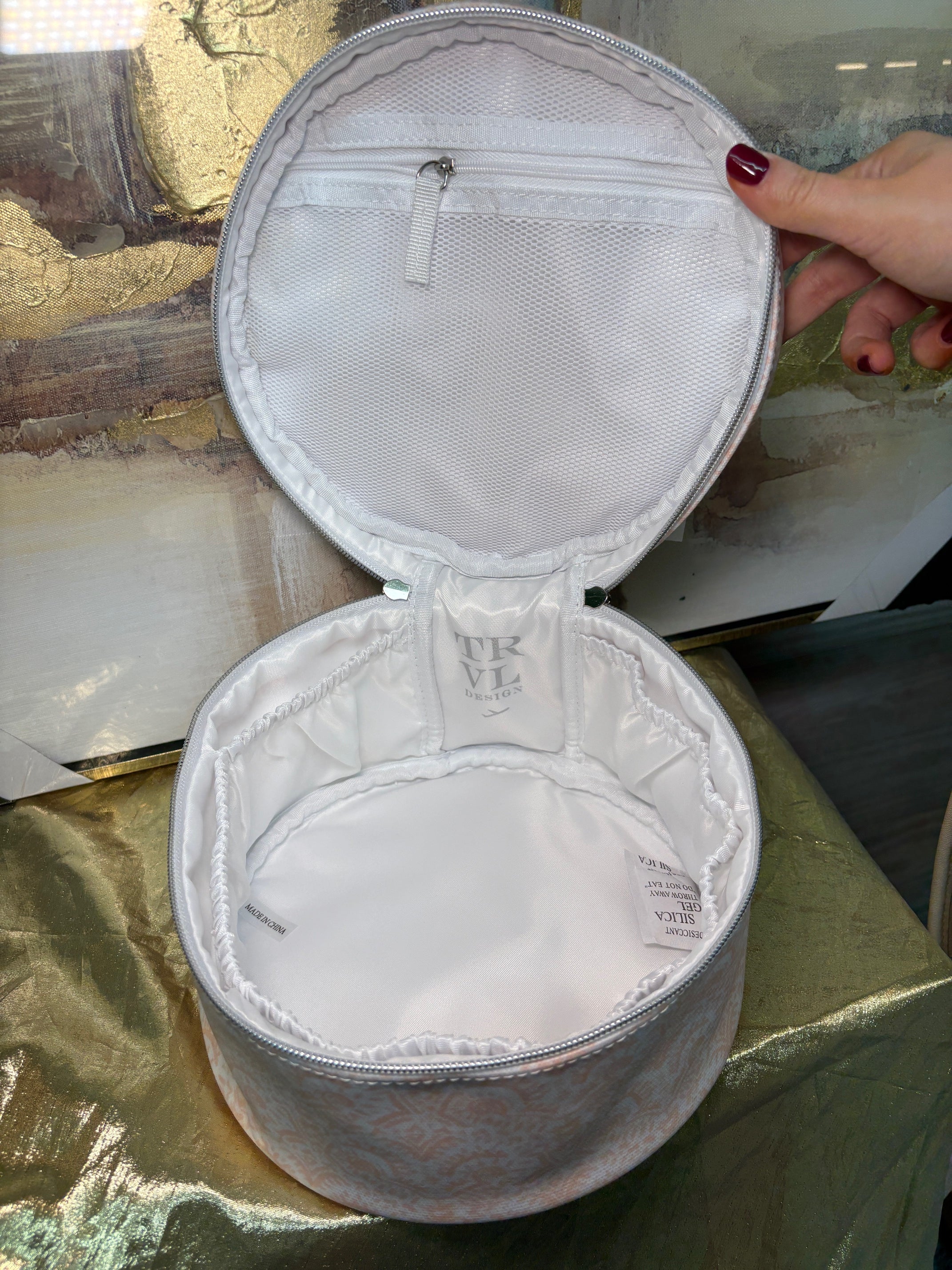 White silicone bra cups on a reflective surface