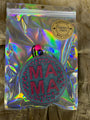 Holographic bag with a 'MIA' patch on a textured brown background