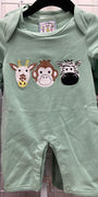 A mint green baby romper with three embroidered animal faces (giraffe, monkey, zebra) on the chest, hanging on a black hanger against a white wire display wall.
