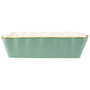 Aqua color casserole dish with a wavy edge detail