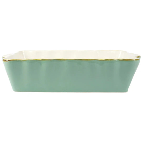 Aqua color casserole dish with a wavy edge detail