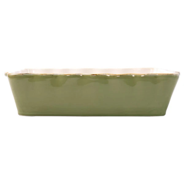 Green color casserole dish with a wavy edge detail
