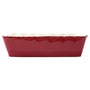 Red color casserole dish with a wavy edge detail