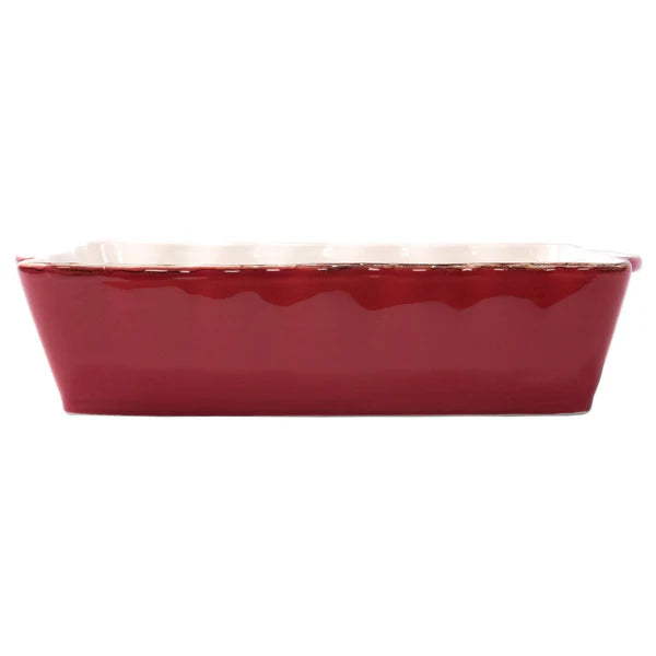 Red color casserole dish with a wavy edge detail