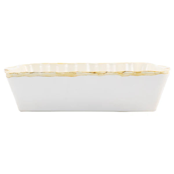 White color casserole dish with a wavy edge detail