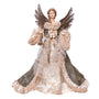 An angel Christmas tree ornament featuring a female angel with brown wings, a beige and white textured gown, and a dark gray cloak, holding a gold trumpet against a white background.