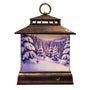 A decorative lantern-shaped light with a dark brown wood-grain frame and a glowing winter forest scene on the front panel, shown against a plain white background.