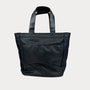 Black tote bag on a light gray background