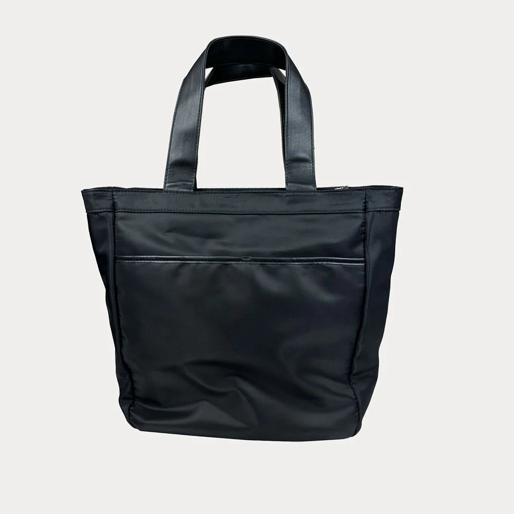 Black tote bag on a light gray background
