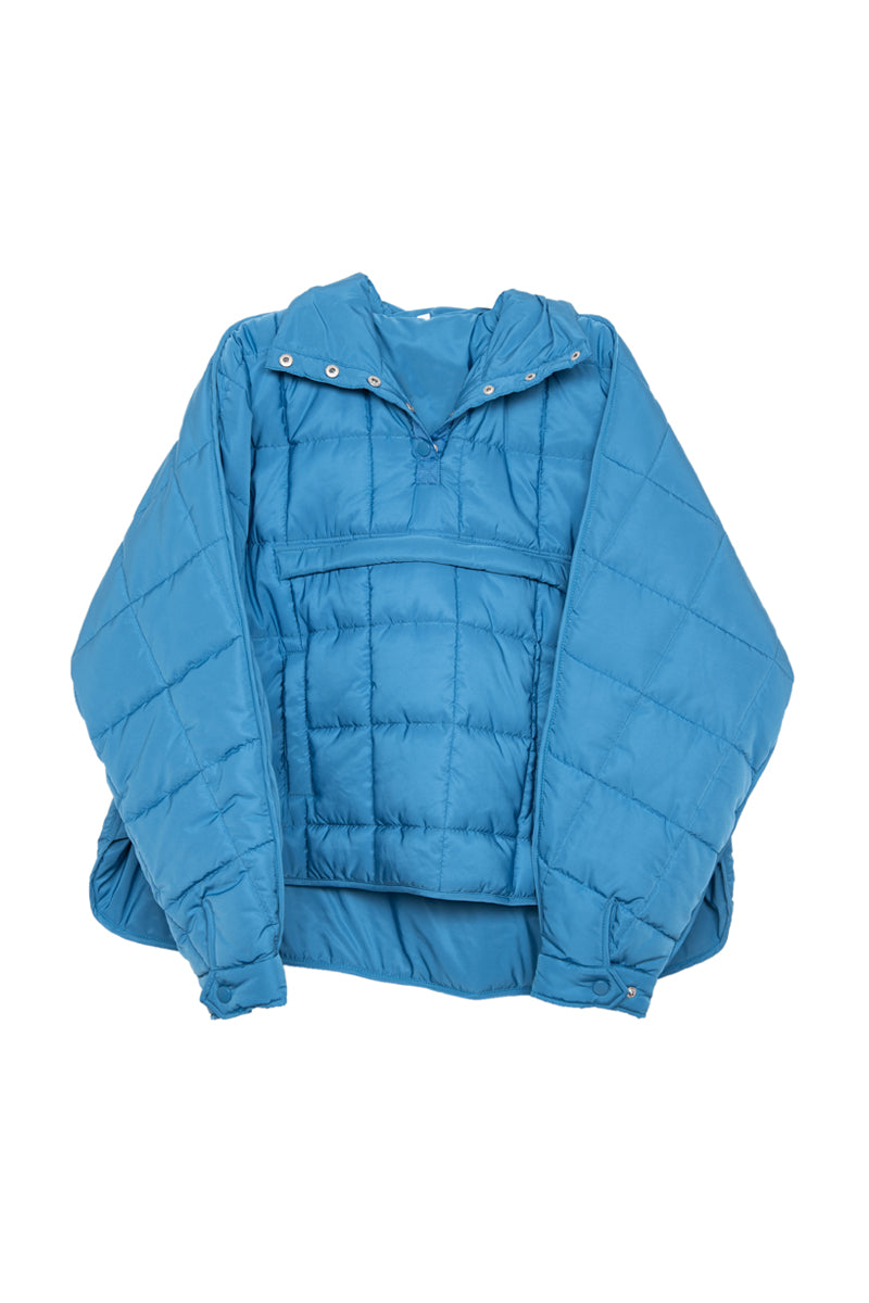Blue puffer pullover on white background