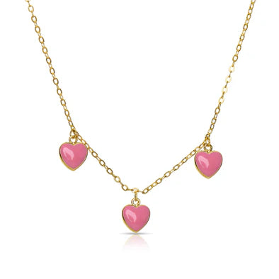 Gold necklace with pink heart-shaped pendants on a white background