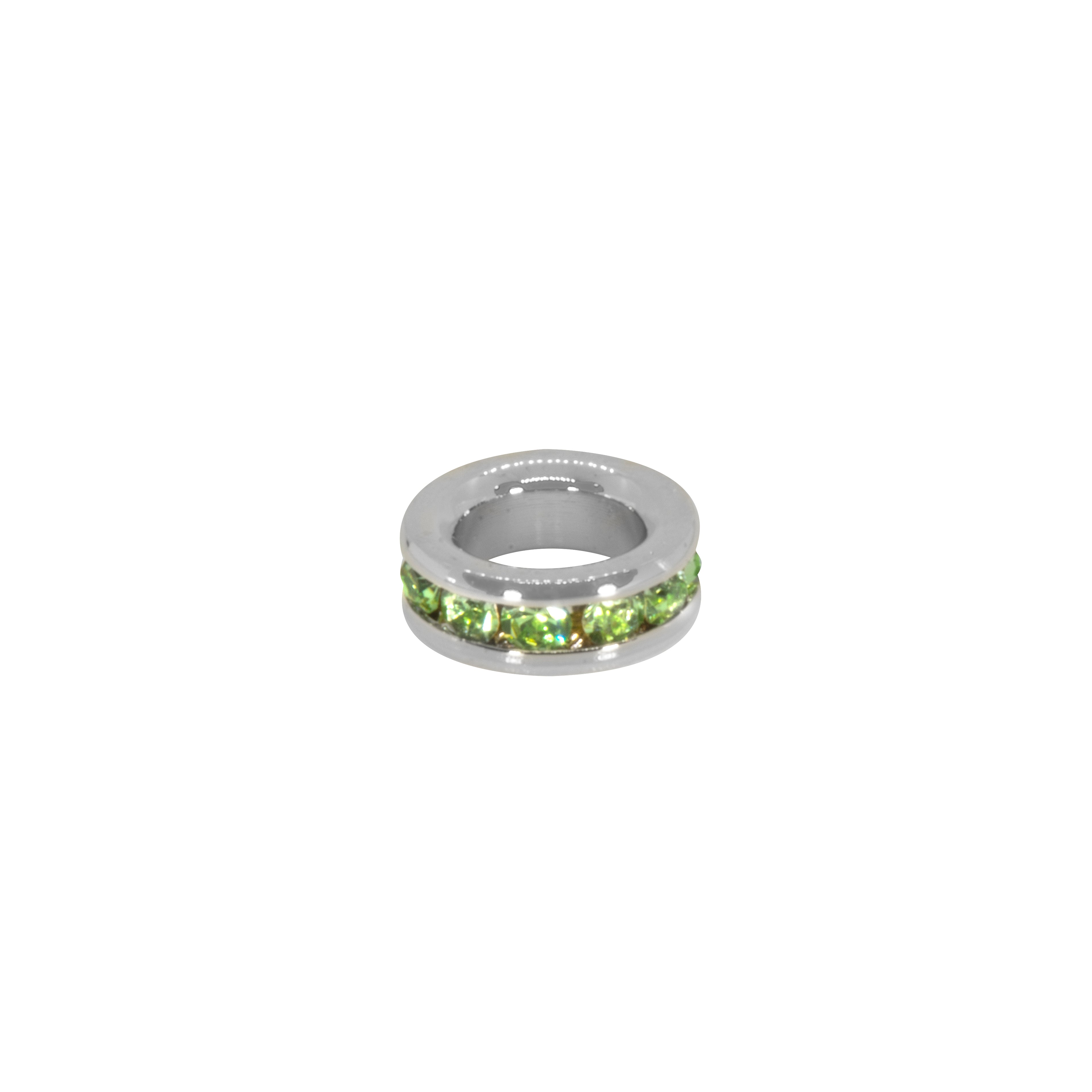 Silver ring with green gemstones on a white background