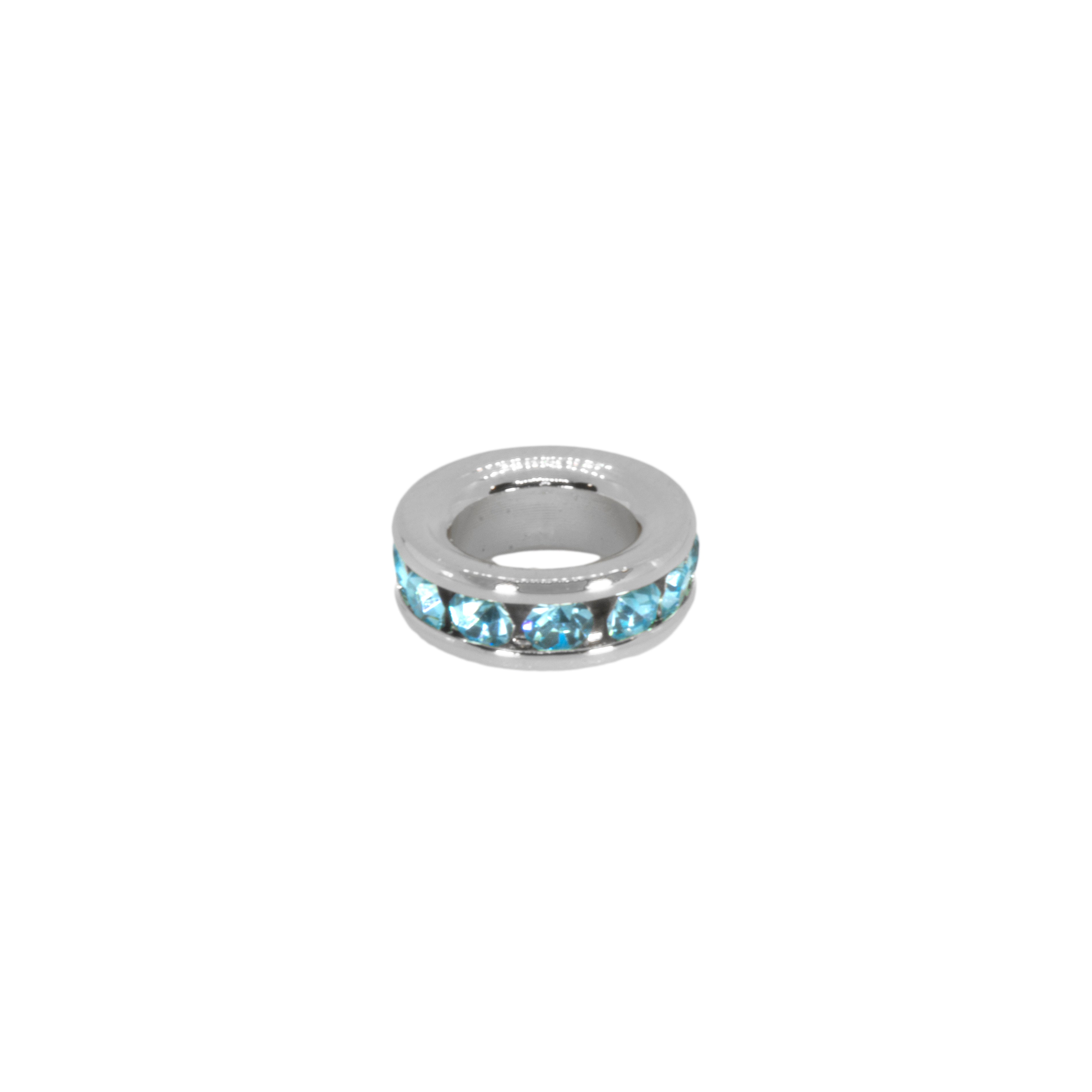 Silver ring with blue gemstones on a white background