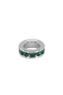 Silver ring with green gemstones on a white background
