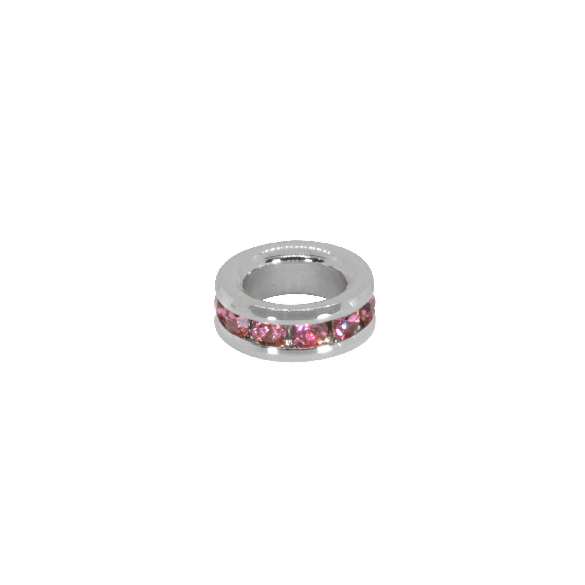 Silver ring with pink gemstones on a white background