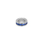 Silver ring with blue gemstones on a white background