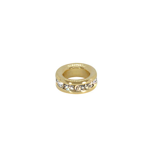Gold ring with embedded crystals on a white background