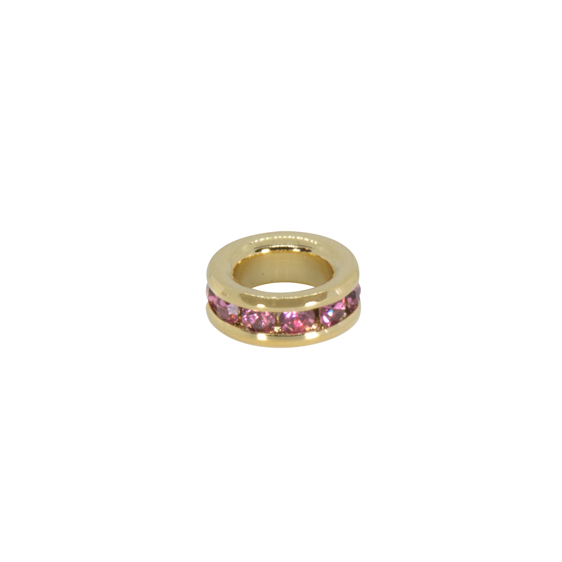 Gold ring with pink gemstones on a white background
