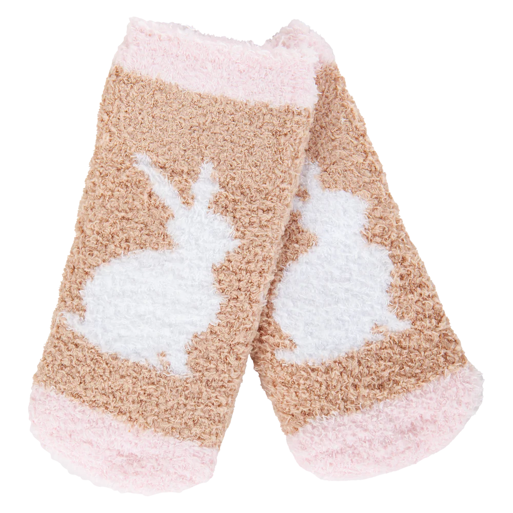 Pair of fuzzy socks with bunny design on a white background