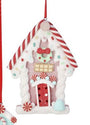 A gingerbread house Christmas ornament with red and white striped roof, a red door, candy cane details, and a hanging red ribbon on a white background.
