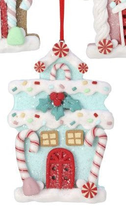 A festive gingerbread house Christmas ornament with a red glittery door, candy cane details, a holly accent, and a red hanging ribbon, shown against a white background.
