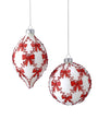 Glass Christmas ornament set with red bow pattern and silver cap, hanging on strings