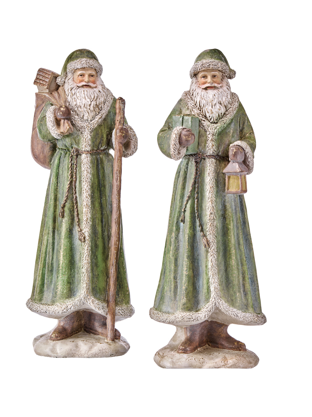 Antique resin Santa figurines: one holds staff, one holds lantern; green robes.