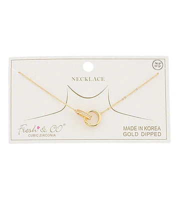 Double link chain on card with necklace on white background