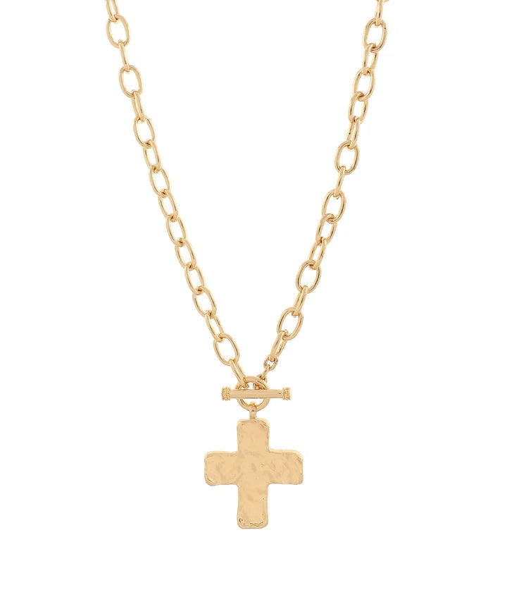 A gold chain necklace with a textured cross pendant and a toggle clasp, shown against a plain white background.