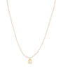 A delicate pearl necklace with a small gold pendant on a solid white background.