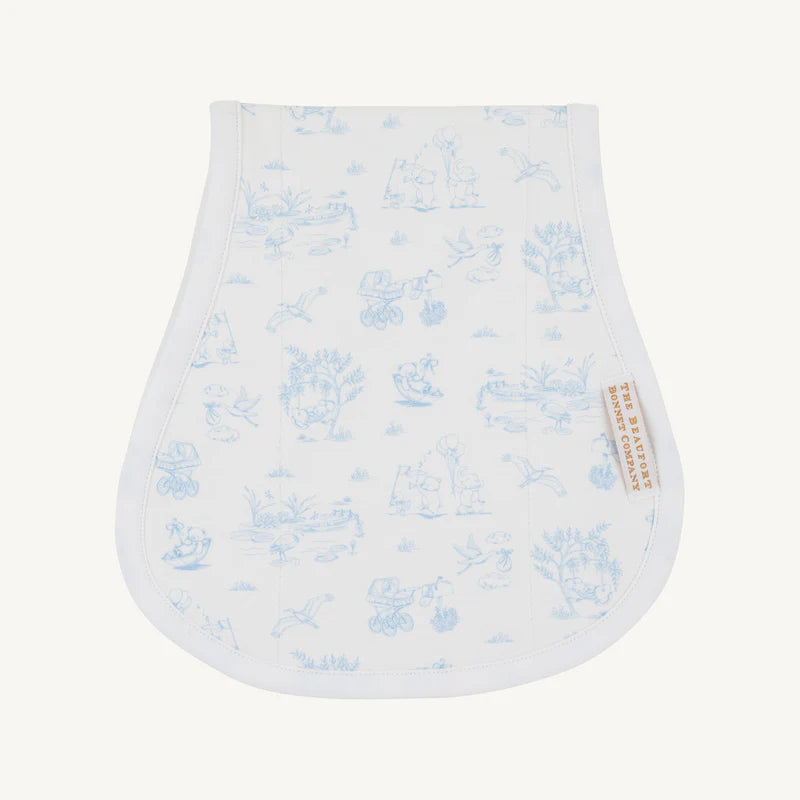 White baby bib with blue floral pattern on a white background