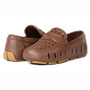 Pair of brown clogs with perforated design on a white background