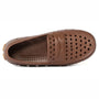 Brown slip-on shoe with perforated design on a white background