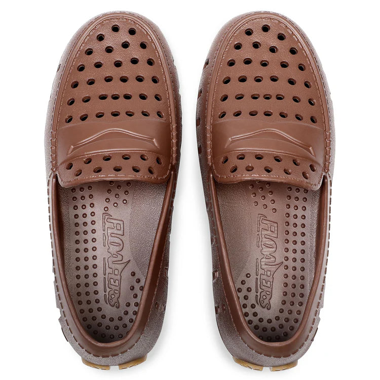 Pair of brown loafers with a brand logo on a white background