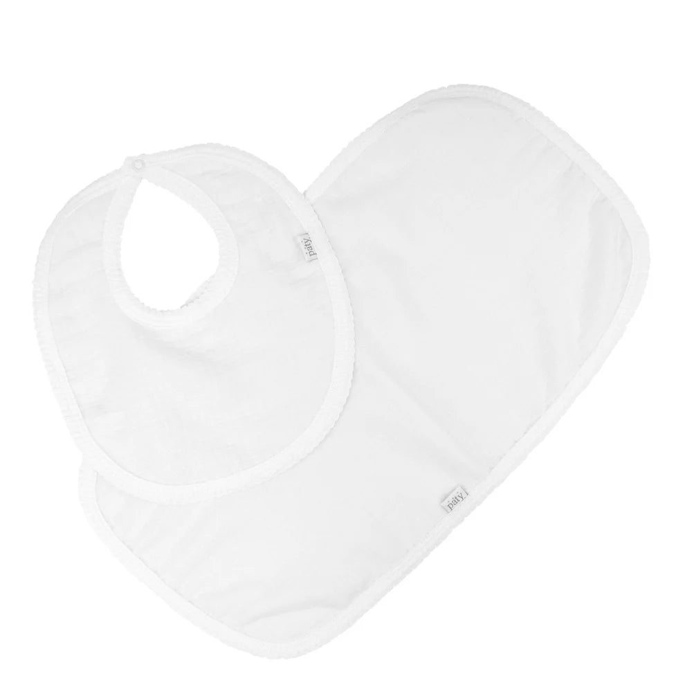 White baby burp cloth and white baby bibs on a white background