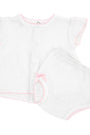 White baby diaper set with pink trim on a white background