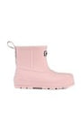 Pink rain boot with a ribbed texture on a white background