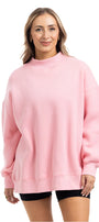 Woman wearing a pink sweatshirt on a white background