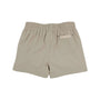 Beige shorts with a brand label on a white background