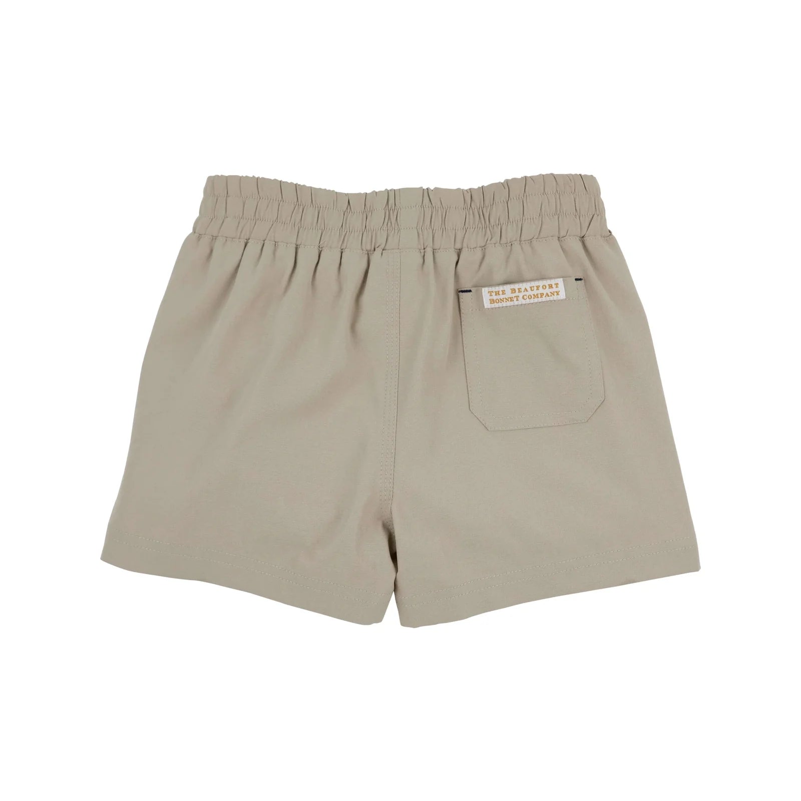 Beige shorts with a brand label on a white background