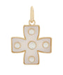 A gold cross pendant featuring a pearlescent white inlay with circular cutouts, set against a plain white background.